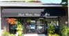 Black awning for Linda Cloutier Kitchens & Baths